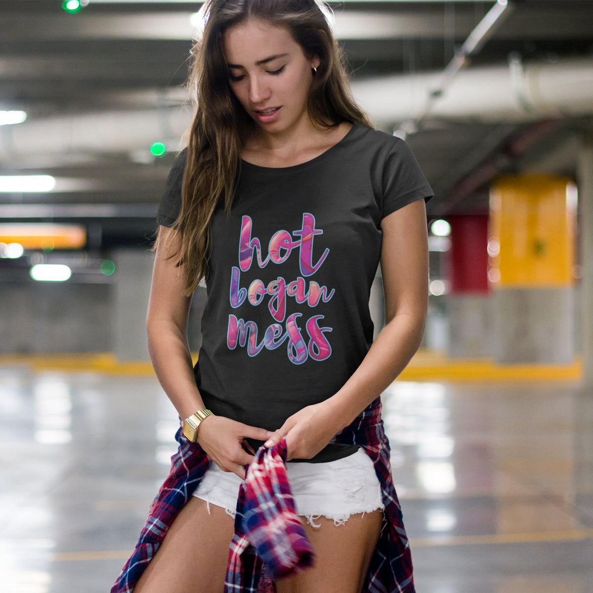 woman wears black tee with Hot Bogan Mess graphic design
