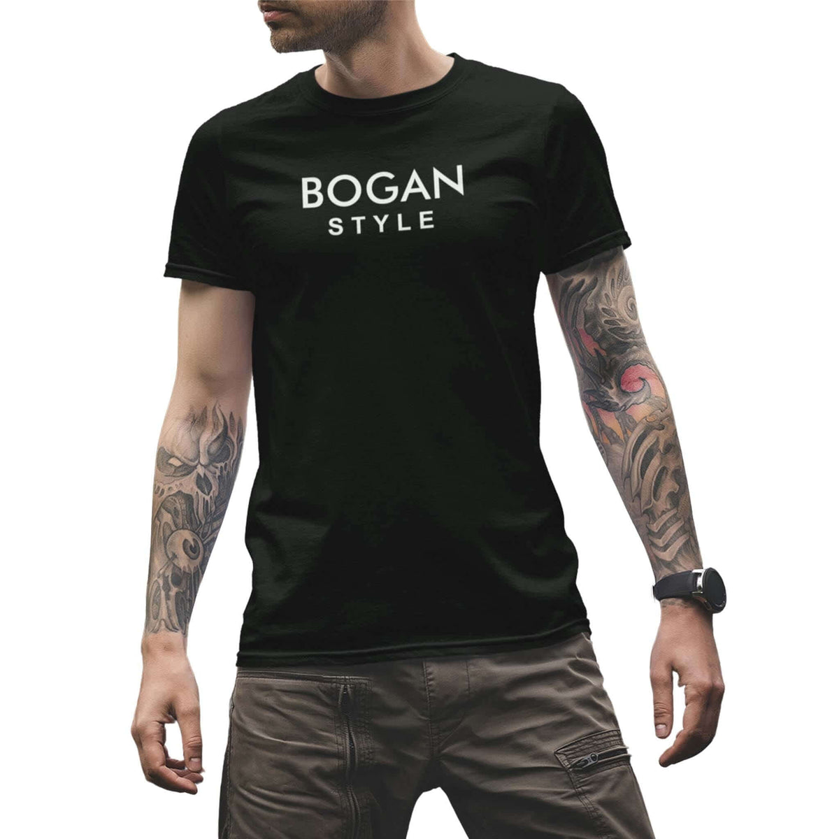 Guy with tattoos wearing black tee with Bogan Style printed on the front