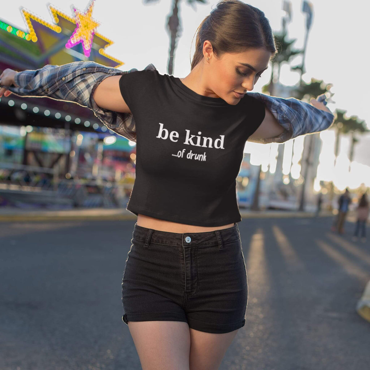 Model wearing Be Kind of drunk crop top at fair