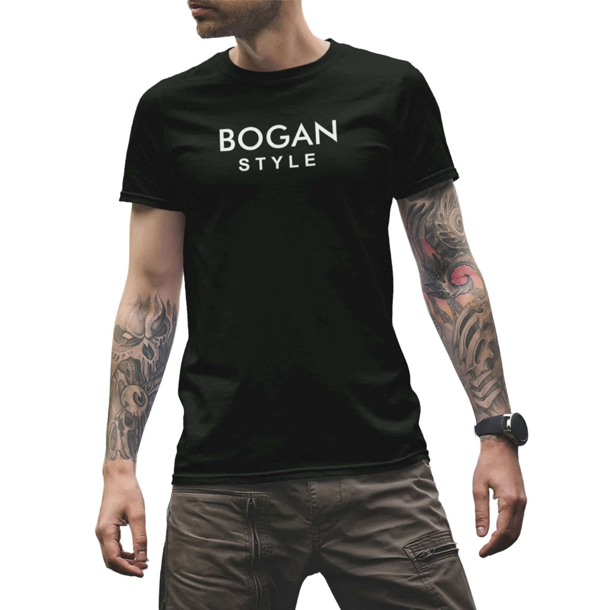 Guy with tattoos wearing black tee with Bogan Style printed on the front 