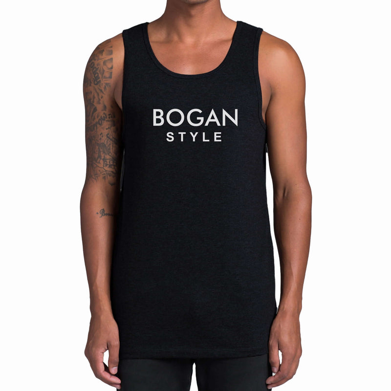 Man wears black tank with Bogan Style on the front