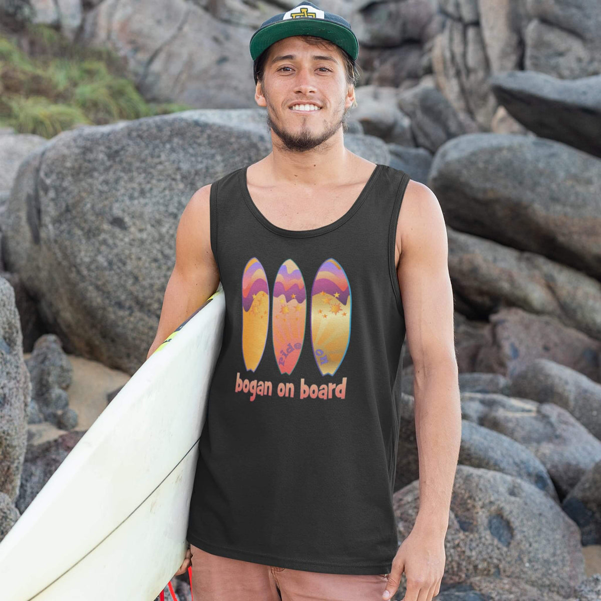 Man wears tank top with Bogan on Board surf design