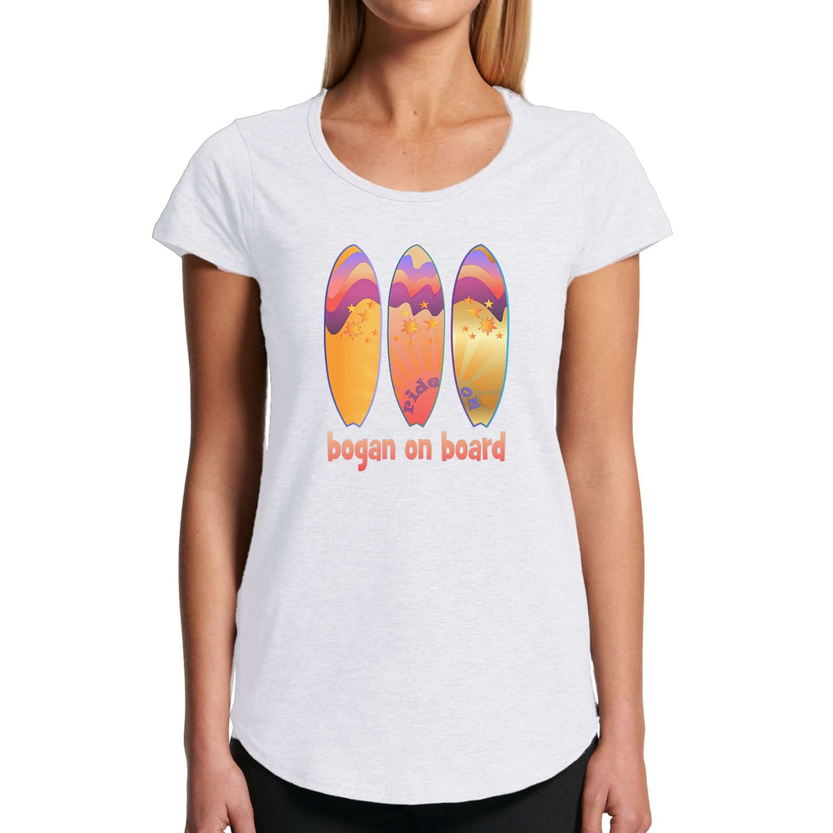 Woman wearing white t shirt with Bogan on Board graphic design featuring three surfboards