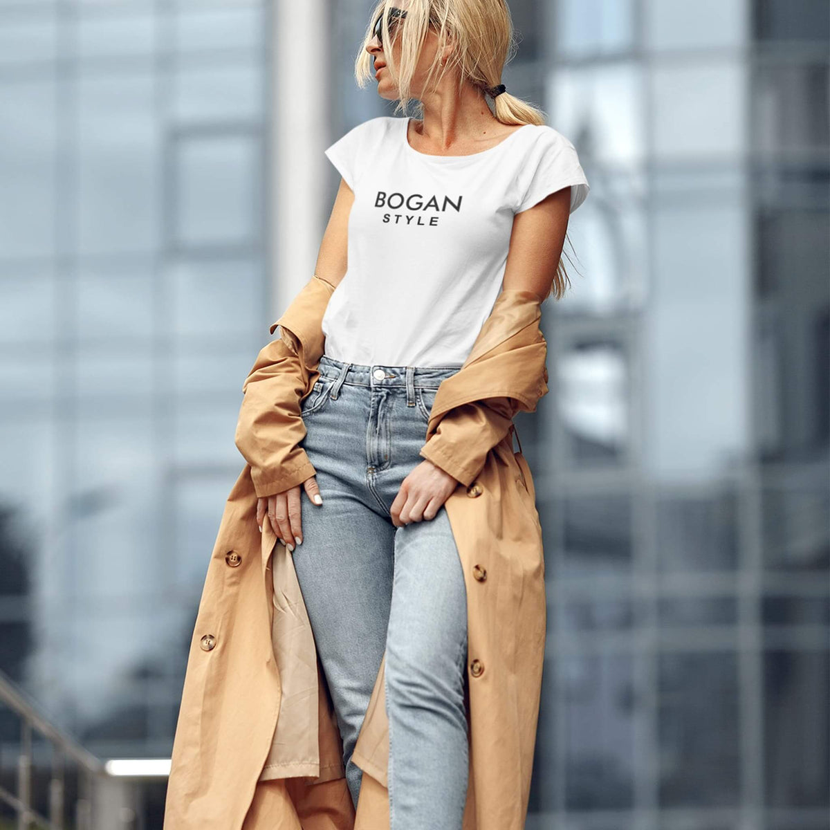 Woman posing in the city wearing white Bogan Style t shirt