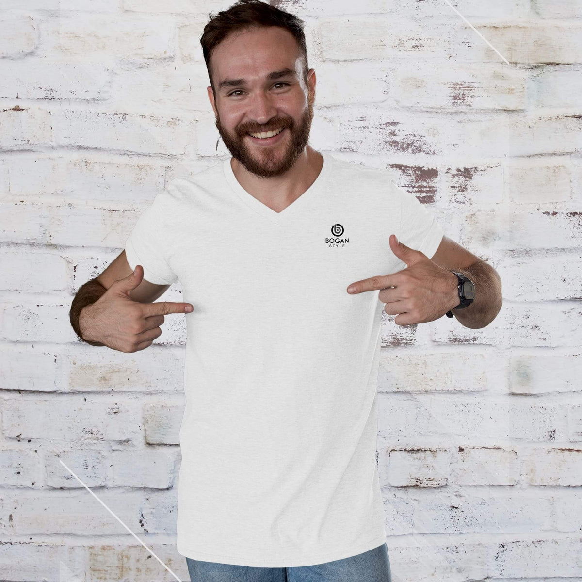 man wears white v neck tee with small Bogan Style logo on chest
